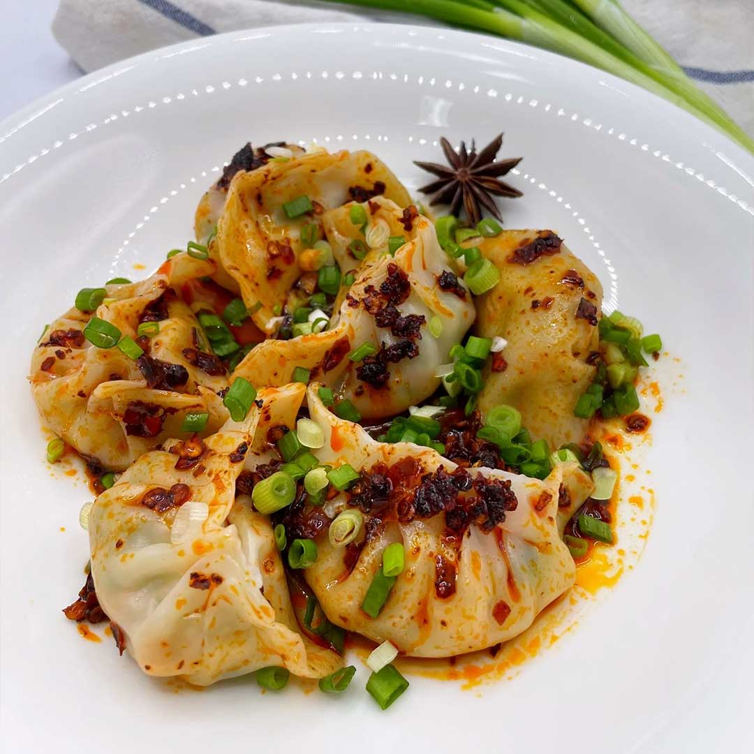 MOMOS (DUMPLINGS) IN SCHEZWAN SAUCE – The Kebabsmith