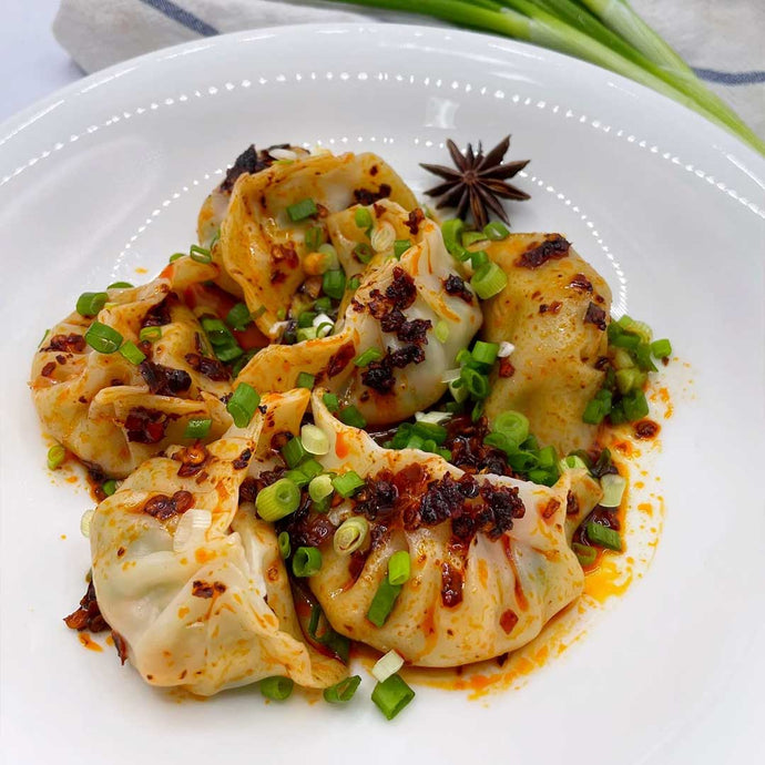 MOMOS (DUMPLINGS) IN SCHEZWAN SAUCE